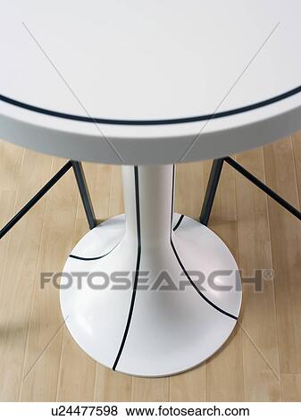 Close-up of modern white pedestal table View Large Photo Image Stock Photo - Close-up of modern white pedestal table. Fotosearch