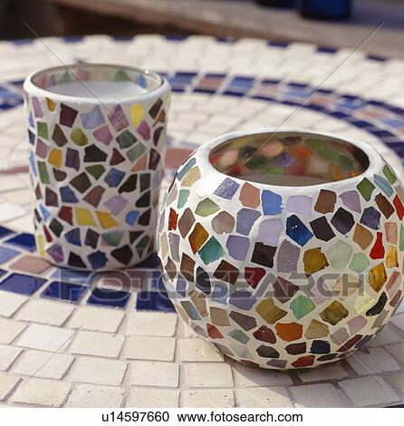 Stock Image - Close-up of mosaic decorated pots. Fotosearch
