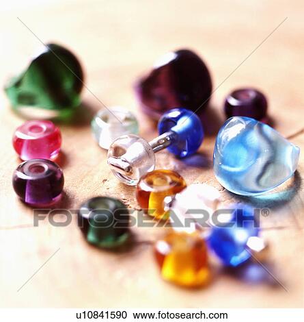 Stock Image - Close-up of multi-coloured glass beads. Fotosearch