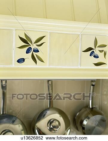 Close-up of olive-patterned wall tiles View Large Photo Image Stock Image - Close-up of olive-patterned wall tiles. Fotosearch
