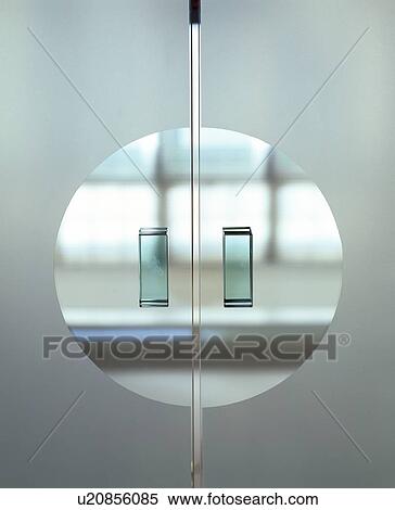 Close-up of opaque glass doors with glass handles View Large Photo Image Stock Photography - Close-up of opaque glass doors with glass handles. Fotosearch