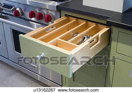 Close-up of open cutlery storage drawer View Large Photo Image Stock Photo - Close-up of open cutlery storage drawer. Fotosearch