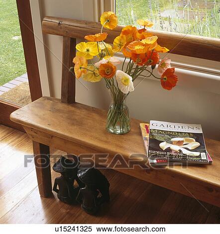 Close-up of orange Californian poppies on wooden table View Large Photo Image Stock Photography - Close-up of orange Californian poppies on wooden table. Fotosearch