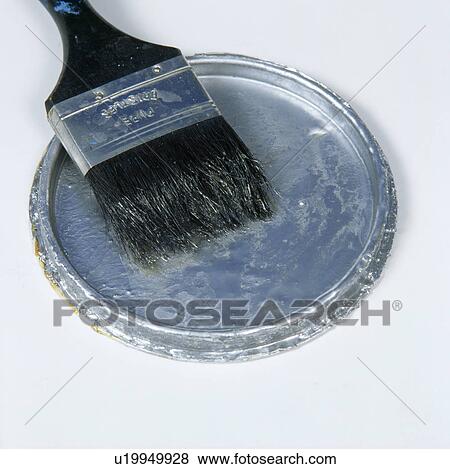 Close-up of paint brush on tin lid View Large Photo Image Stock Photo - Close-up of paint brush on tin lid. Fotosearch