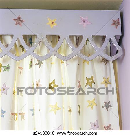 Close-up of painted MDF pelmet and star-patterned curtains View Large Photo Image Stock Photo - Close-up of painted MDF pelmet and star-patterned curtains. Fotosearch