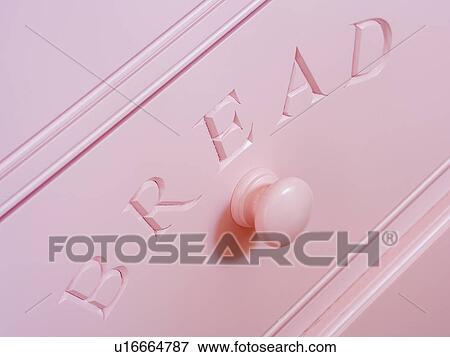 Stock Photo - Close-up of pale pink bread drawer. Fotosearch