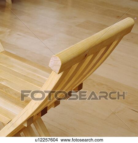 Picture - Close-up of pale wood chair. Fotosearch