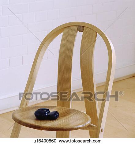 Close-up of pale wood chair View Large Photo Image Stock Image - Close-up of pale wood chair. Fotosearch
