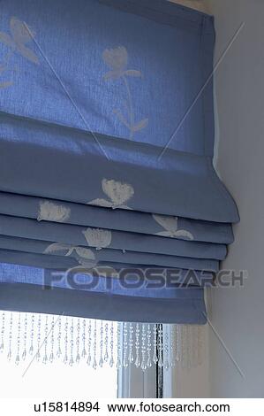 Close-up of patterned blue silk blind View Large Photo Image Picture - Close-up of patterned blue silk blind. Fotosearch