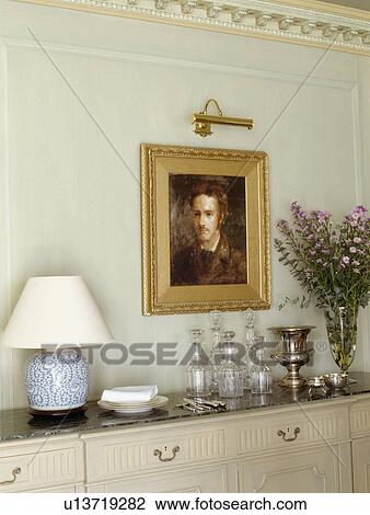 Close-up of picture above lamp on sideboard View Large Photo Image Stock Image - Close-up of picture above lamp on sideboard. Fotosearch