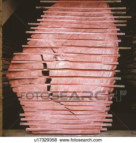 Stock Photo - Close-up of planks of timber painted pink. Fotosearch