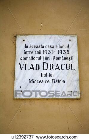 Stock Photo - Close up of plaque commemorating Count Dracula in Transylvania in Romania&#10;. Fotosearch