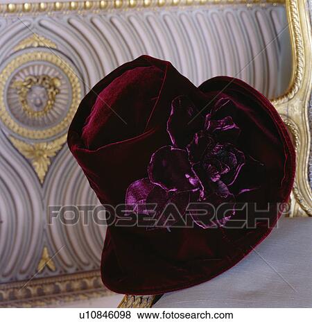 Close-up of purple velvet hat on chair View Large Photo Image Stock Photo - Close-up of purple velvet hat on chair. Fotosearch