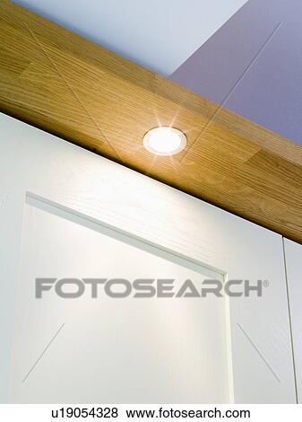 Close-up of recessed lighting above kitchen cupboard View Large Photo Image Stock Photo - Close-up of recessed lighting above kitchen cupboard. Fotosearch