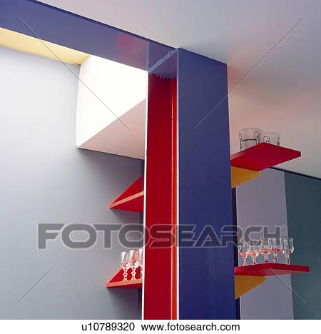 Stock Image - Close-up of red and blue kitchen shelves. Fotosearch
