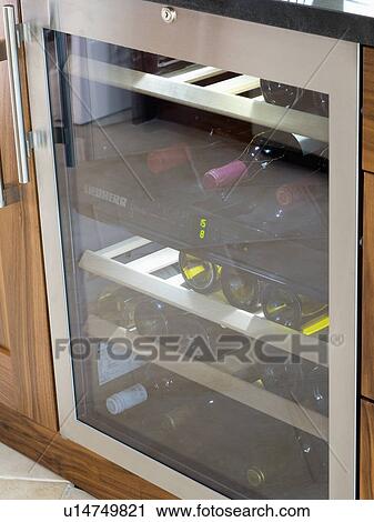 Close-up of refrigerated wine cooler View Large Photo Image Stock Image - Close-up of refrigerated wine cooler. Fotosearch