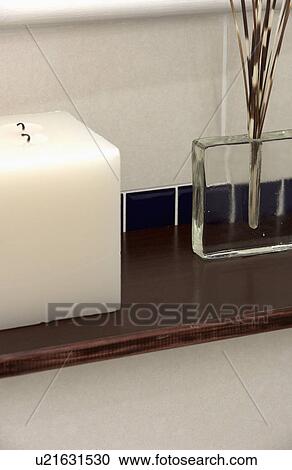Stock Image - Close-up of square white candle. Fotosearch