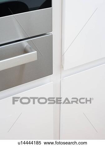 Stock Photography - Close-up of stainless steel kitchen drawer. Fotosearch