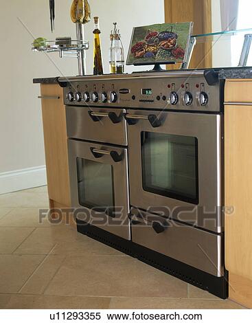 Close-up of stainless-steel range oven in modern kitchen View Large Photo Image Stock Photography - Close-up of stainless-steel range oven in modern kitchen. Fotosearch