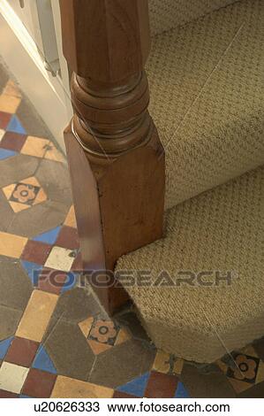 Close-up of tessellated tiled floor beside staircase with cream carpet View Large Photo Image Stock Image - Close-up of tessellated tiled floor beside staircase with cream carpet. Fotosearch