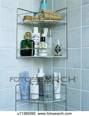 Close-up of toiletries on stainless steel bathroom shelving View Large Photo Image Stock Image - Close-up of toiletries on stainless steel bathroom shelving. Fotosearch