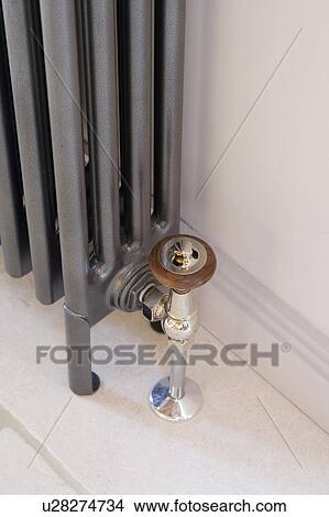 Picture - Close-up of traditional metal radiator. Fotosearch
