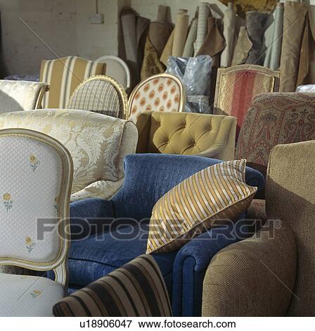 Stock Photo - Close-up of traditional upholstered armchairs. Fotosearch