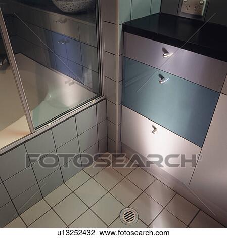 Close-up of turquoise drawers in bathroom vanity unit View Large Photo Image Stock Image - Close-up of turquoise drawers in bathroom vanity unit. Fotosearch