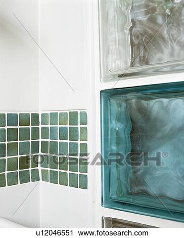 Close-up of turquoise wall tiles and glass bricks View Large Photo Image Stock Image - Close-up of turquoise wall tiles and glass bricks. Fotosearch