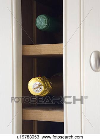 Stock Image - Close-up of wine storage. Fotosearch