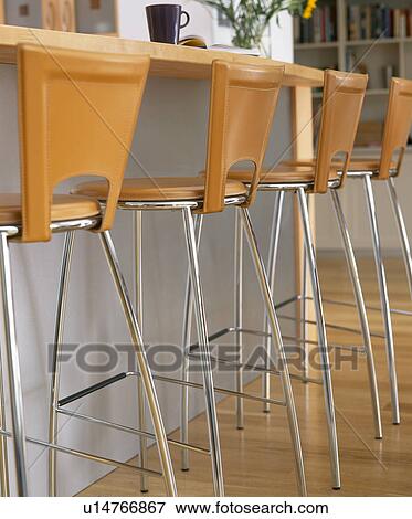 Close-up of wood and metal bar stools View Large Photo Image Stock Photo - Close-up of wood and metal bar stools. Fotosearch