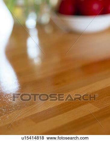 Stock Photo - Close-up of wooden kitchen worktop. Fotosearch