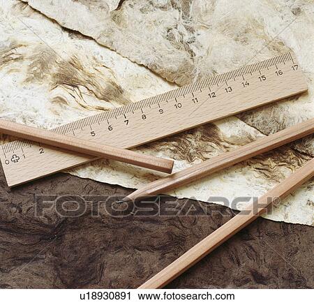 Close-up of wooden pencils and ruler on hand-made paper View Large Photo Image Stock Image - Close-up of wooden pencils and ruler on hand-made paper. Fotosearch