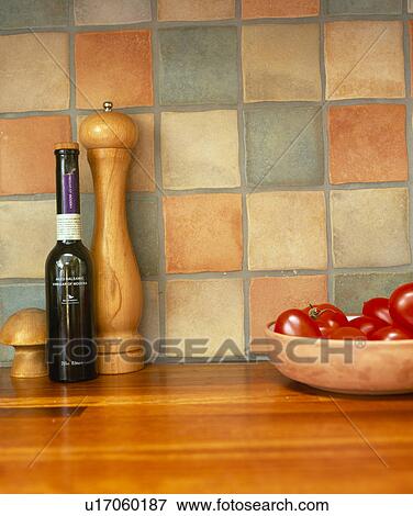 Close-up of wooden peppermill in front of ceramic wall tiles View Large Photo Image Stock Photo - Close-up of wooden peppermill in front of ceramic wall tiles. Fotosearch