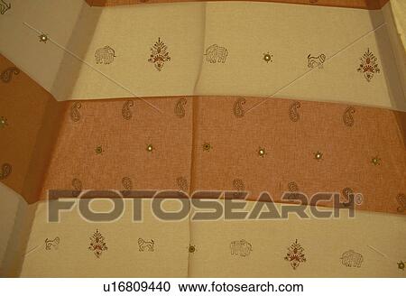 Close-up of yellow and orange cloth lining traditional Rajastani tent View Large Photo Image Stock Image - Close-up of yellow and orange cloth lining traditional Rajastani tent. Fotosearch