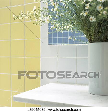Close-up of yellow and white wall tiles in modern tiled bathroom View Large Photo Image Stock Photo - Close-up of yellow and white wall tiles in modern tiled bathroom. Fotosearch