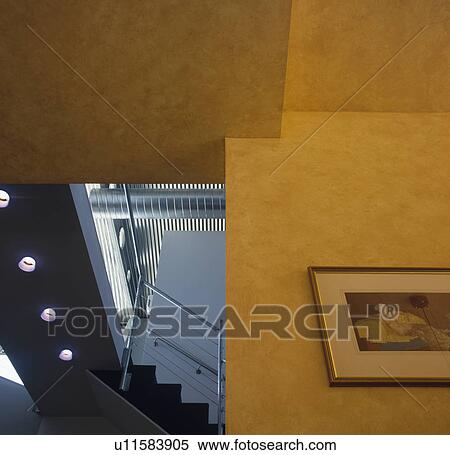 Close-up of yellow wall in modern hall View Large Photo Image Stock Photography - Close-up of yellow wall in modern hall. Fotosearch