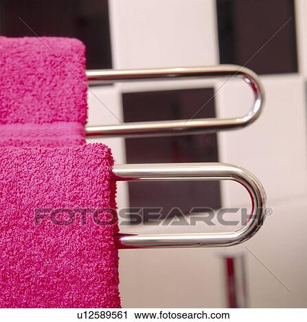 Close-up pf pink towels on metal towel rail View Large Photo Image Stock Image - Close-up pf pink towels on metal towel rail. Fotosearch
