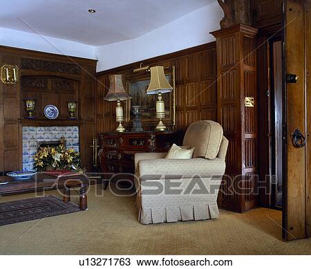 Cream armchair in panelled living room View Large Photo Image Stock Image - Cream armchair in panelled living room. Fotosearch