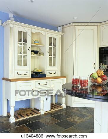 Cream Dresser In Pastel Blue Country Kitchen Stock Photograph