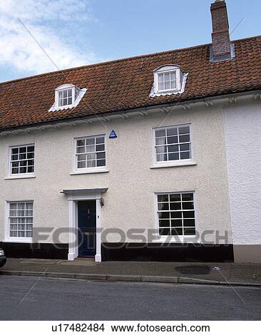 Cream painted terraced house in country village View Large Photo Image Picture - Cream painted terraced house in country village. Fotosearch