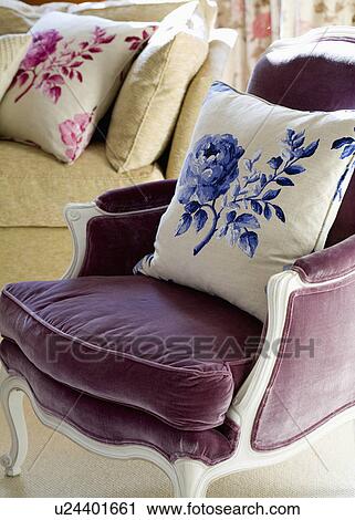Cream+blue rose-print cushion on purple velour French-style armchair View Large Photo Image Stock Image - Cream+blue rose-print cushion on purple velour French-style armchair. Fotosearch