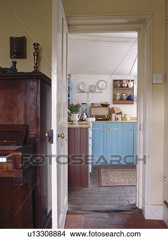Door open to traditional country kitchen View Large Photo Image Picture - Door open to traditional country kitchen. Fotosearch