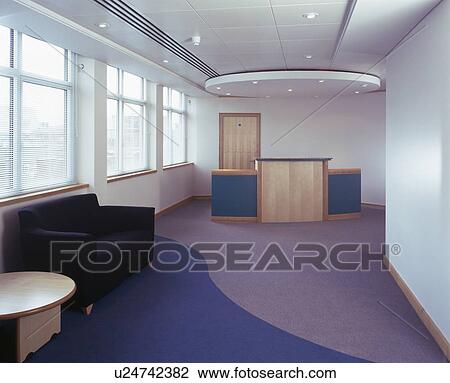 Empty reception area in modern city office View Large Photo Image Stock Image - Empty reception area in modern city office. Fotosearch