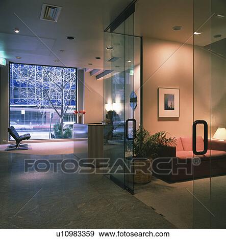 Entrance hall and reception area in modern city office View Large Photo Image Stock Photo - Entrance hall and reception area in modern city office. Fotosearch