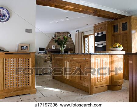 Fitted wood units in cottage kitchen View Large Photo Image Stock Photograph - Fitted wood units in cottage kitchen. Fotosearch