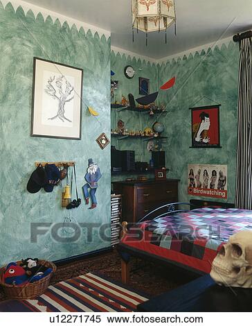 Stock Photography - Green spongeing effect walls in child's eighties bedroom. Fotosearch