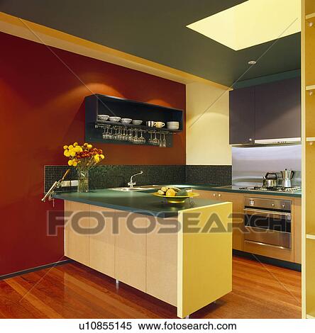 Green worktops in modern kitchen with red wall View Large Photo Image Stock Photography - Green worktops in modern kitchen with red wall. Fotosearch