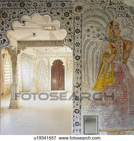 Stock Photo - Intricate mosaic tiling on walls and above ornate doorway in the Udai Bilas Palace in Dungarpur in Rajastan. Fotosearch