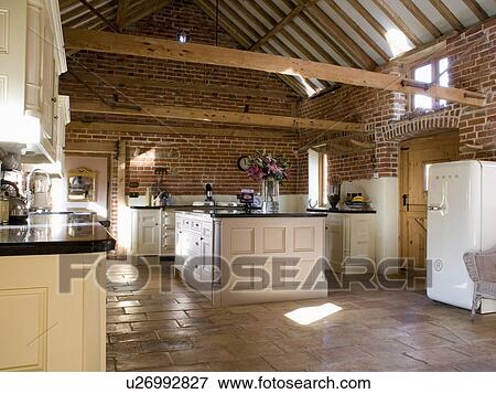 Large Barn Conversion Kitchen With Flagstone Floor And Exposed